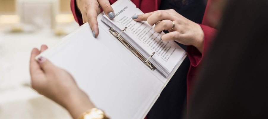event-manager-showing-plan-paper
